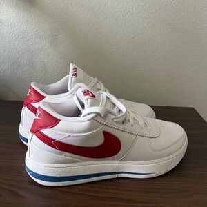 Nike Kids Sneakers in White with Red and Blue Accents